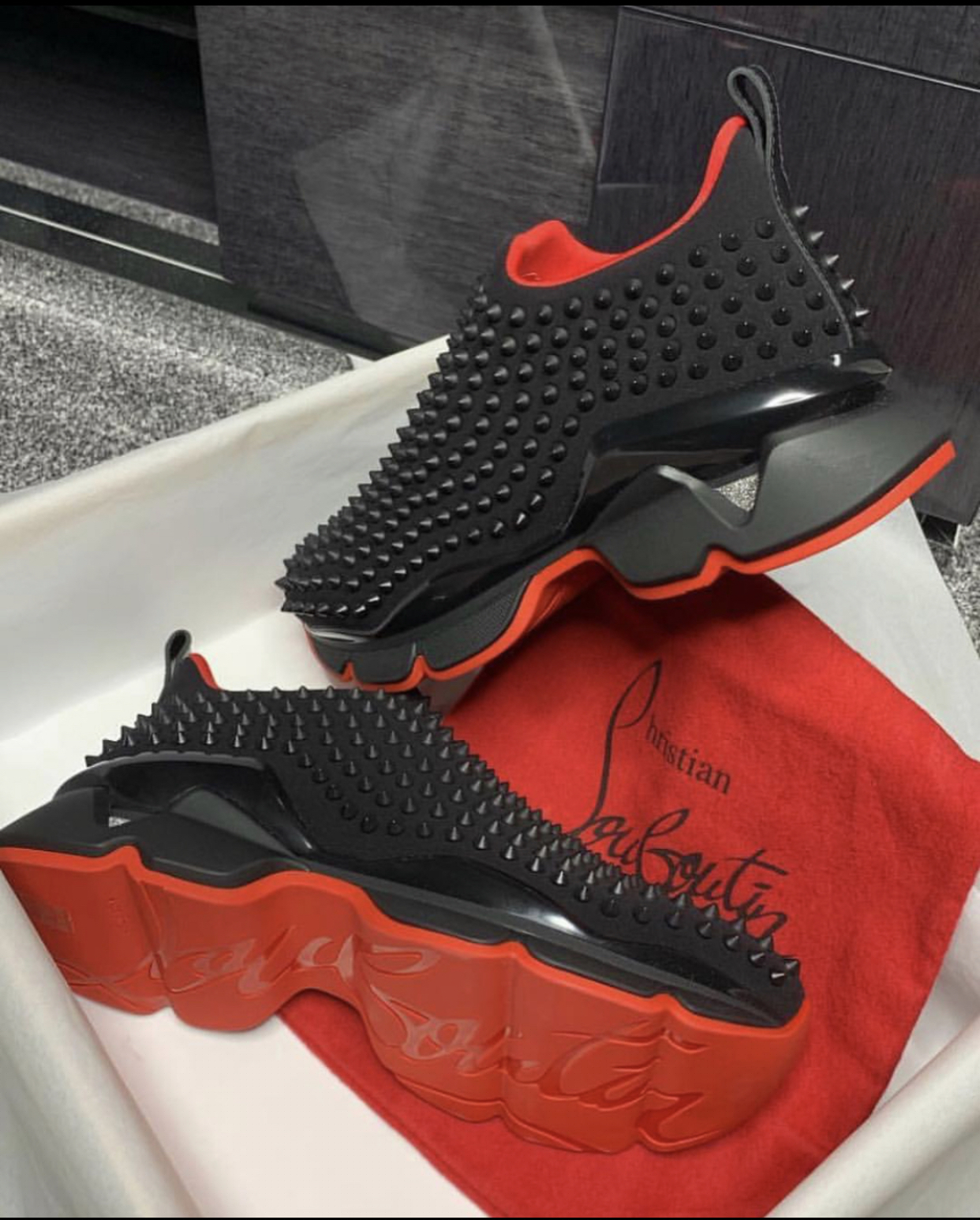 LOUBOUTIN BLACK AND RED STUDS